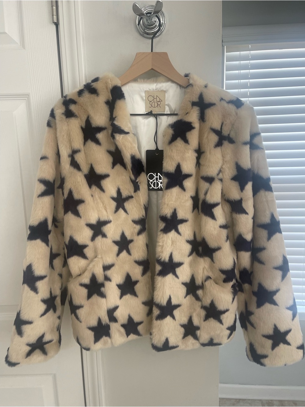 Chaser Cream Faux Fur Jacket with Black Star Print